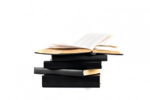 stock-photo-stack-black-hardcover-books-isolated